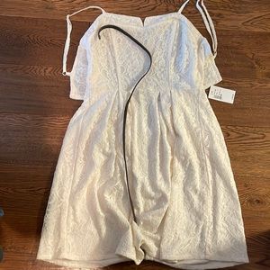 Kismet size m cream dress. BNWT